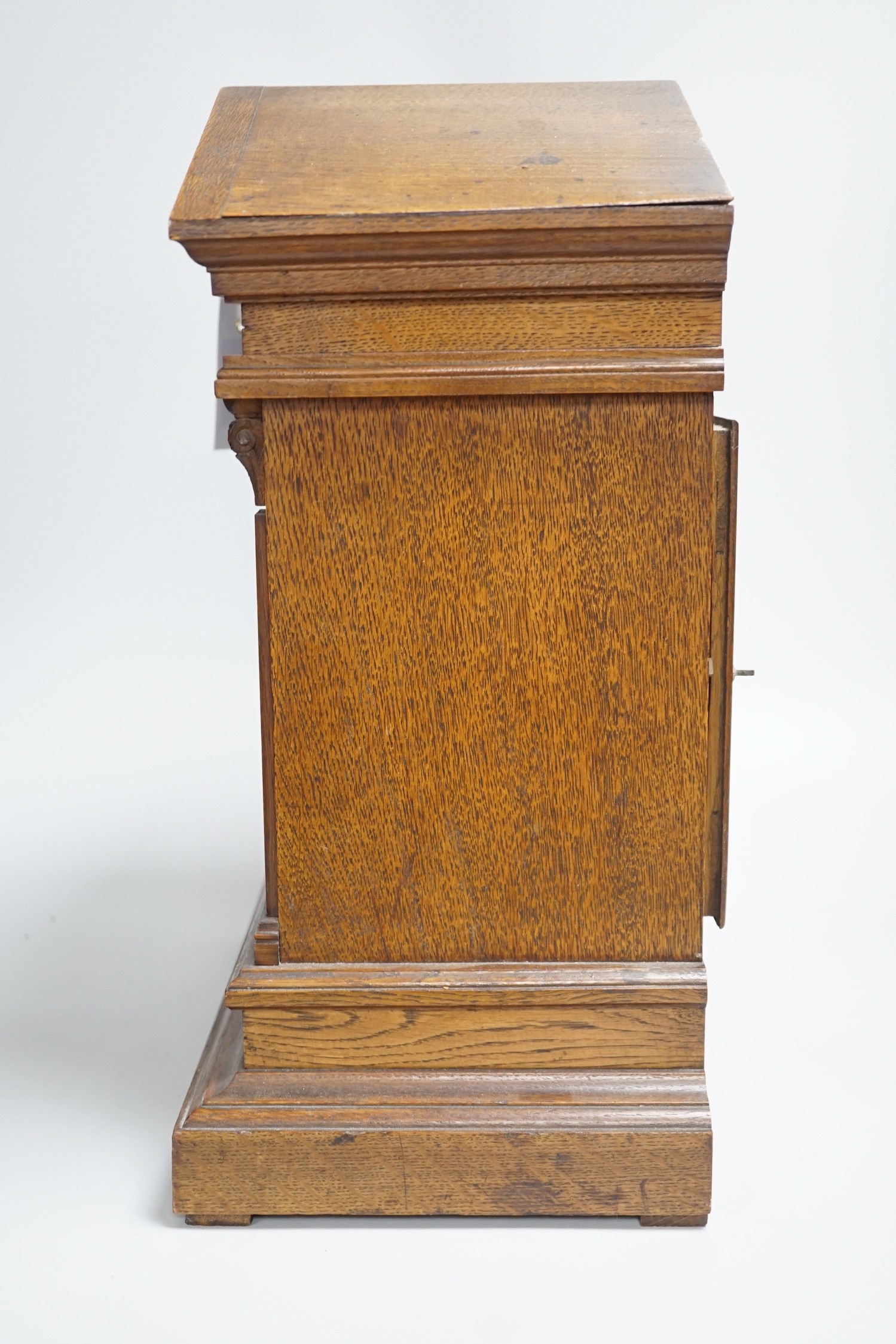 A late 19th century Black Forest oak bracket clock, 40.5cm